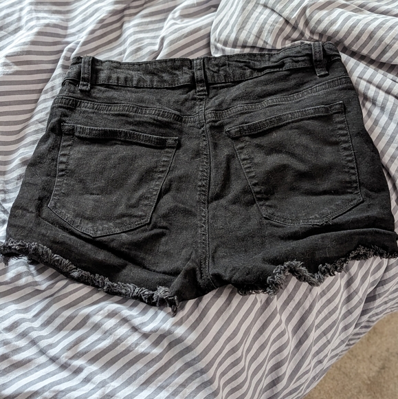 Distressed denim shorts - Picture 2 of 4